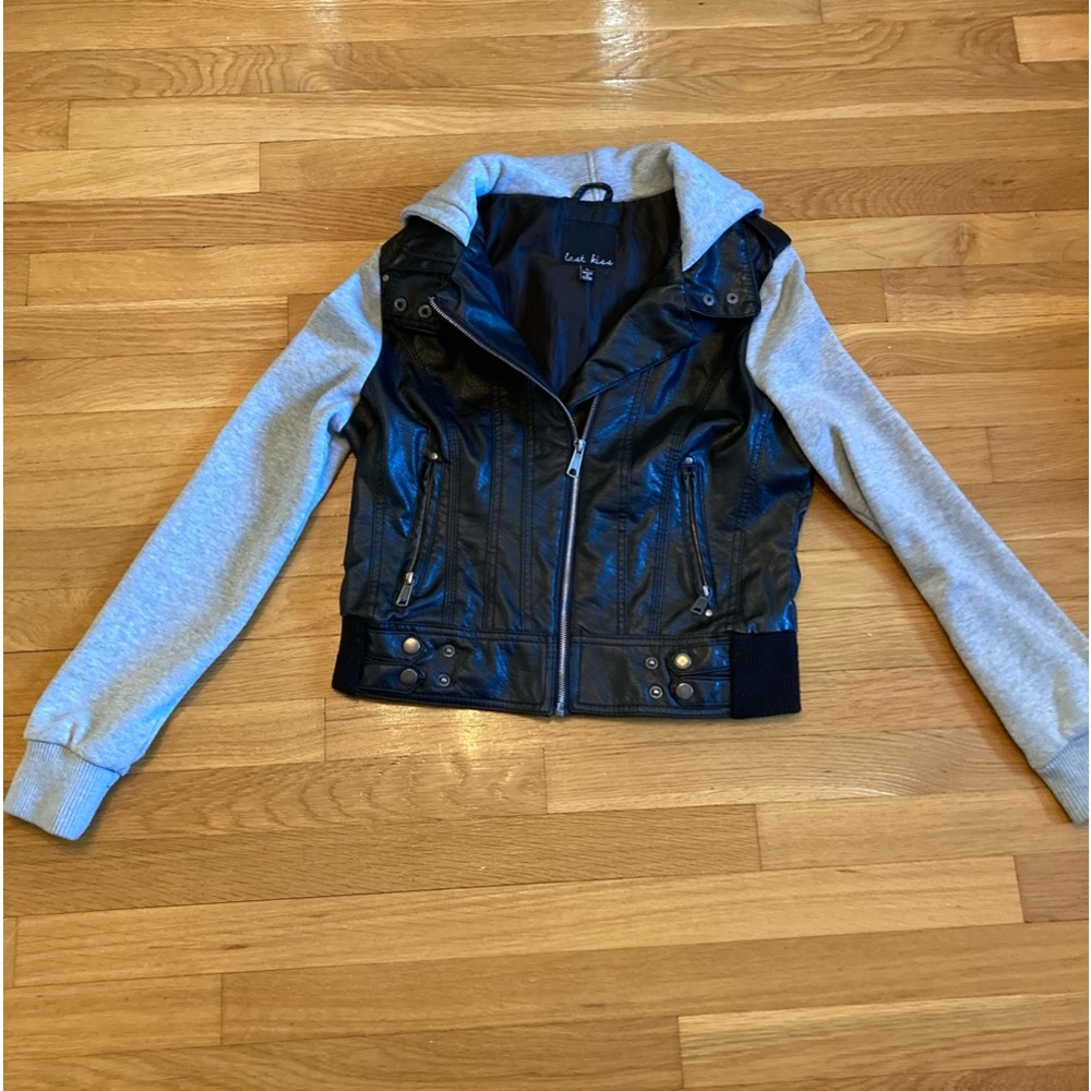 Faux leather jacket with sweatshirt sleeves. Size L but really is like size S.